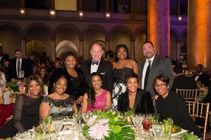 Seated, from left: Chevron employees and their guests Shauna Brown, Nadia Quarles, Charmaine Jackson, Shawna Menifee and Kelly Neal. standing, from left: Kerry-ann Powell, David Feldman, Mia Spicer and Rene Sedivy. 