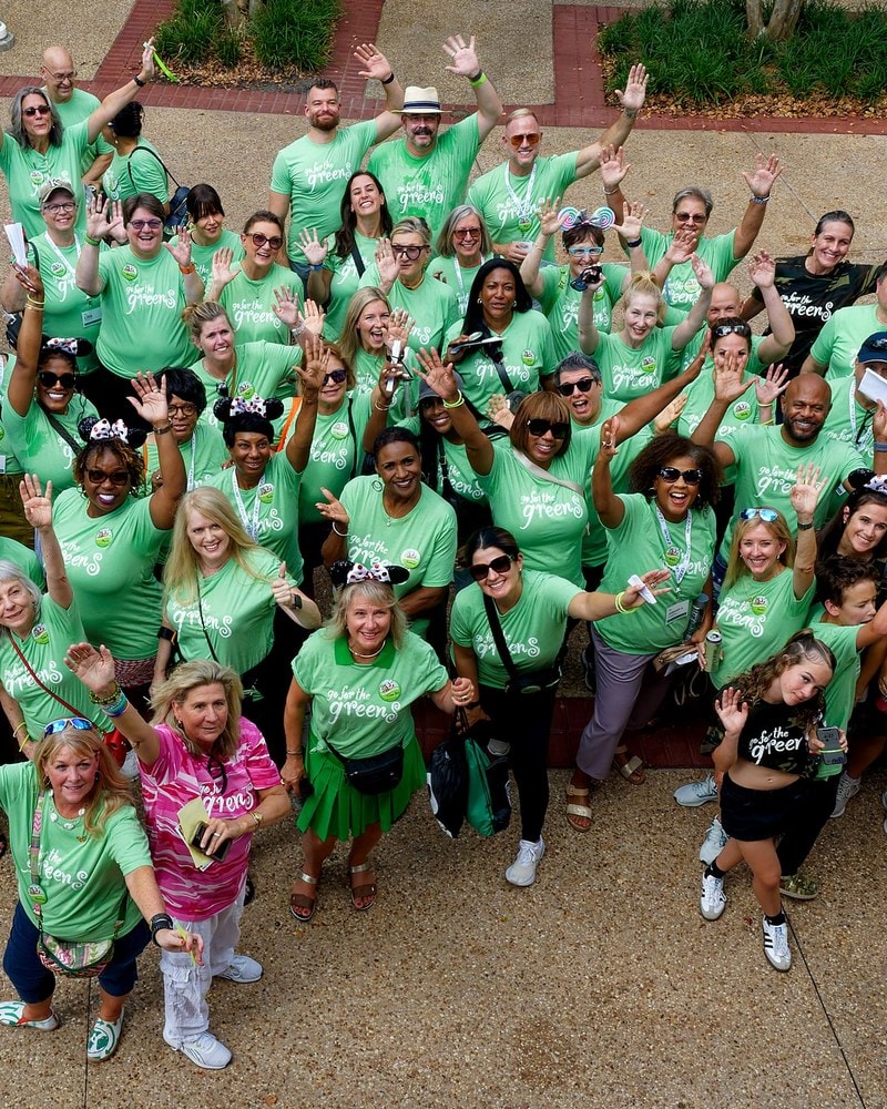 Go for the Greens attendees in matching green t-shirts, group photo