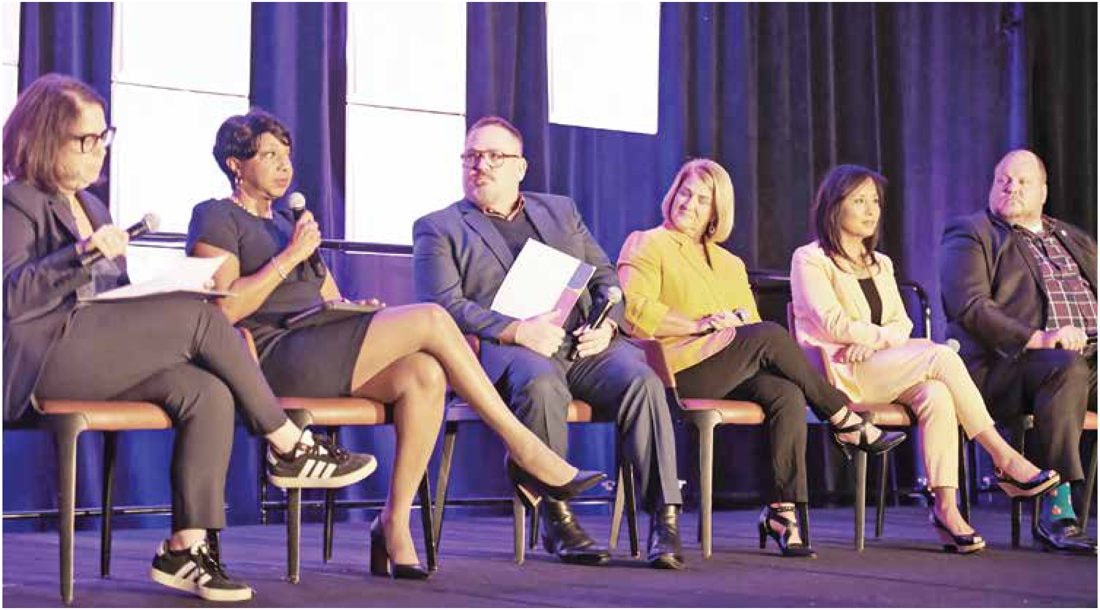 Pamela Prince-Eason on stage with fellow leaders at a WIPP panel discussion.